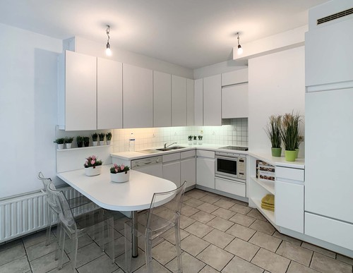 Gezellig appartement met 2 slaapkamers, inpandige garage en kelderberging te Maasmechelen