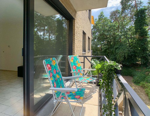 Gezellig appartement met 2 slaapkamers, inpandige garage en kelderberging te Maasmechelen