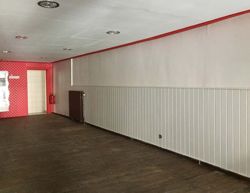 Handelsruimte met appartement en garage te Dilsen-Stokkem