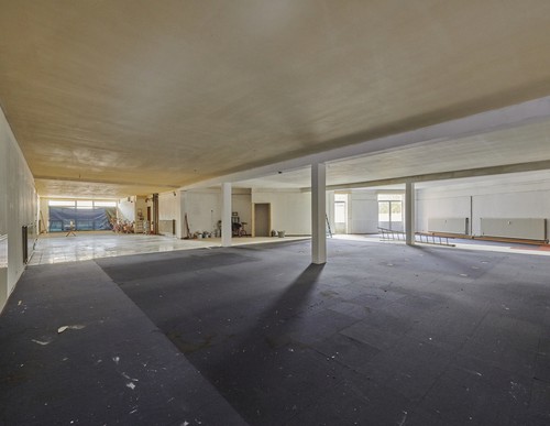 Handelspand met woonst te koop in Neerpelt centrum