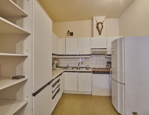 Handelspand met woonst te koop in Neerpelt centrum