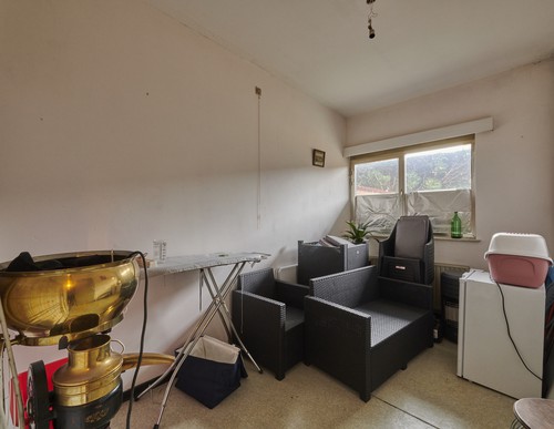 Handelspand met woonst te koop in Neerpelt centrum